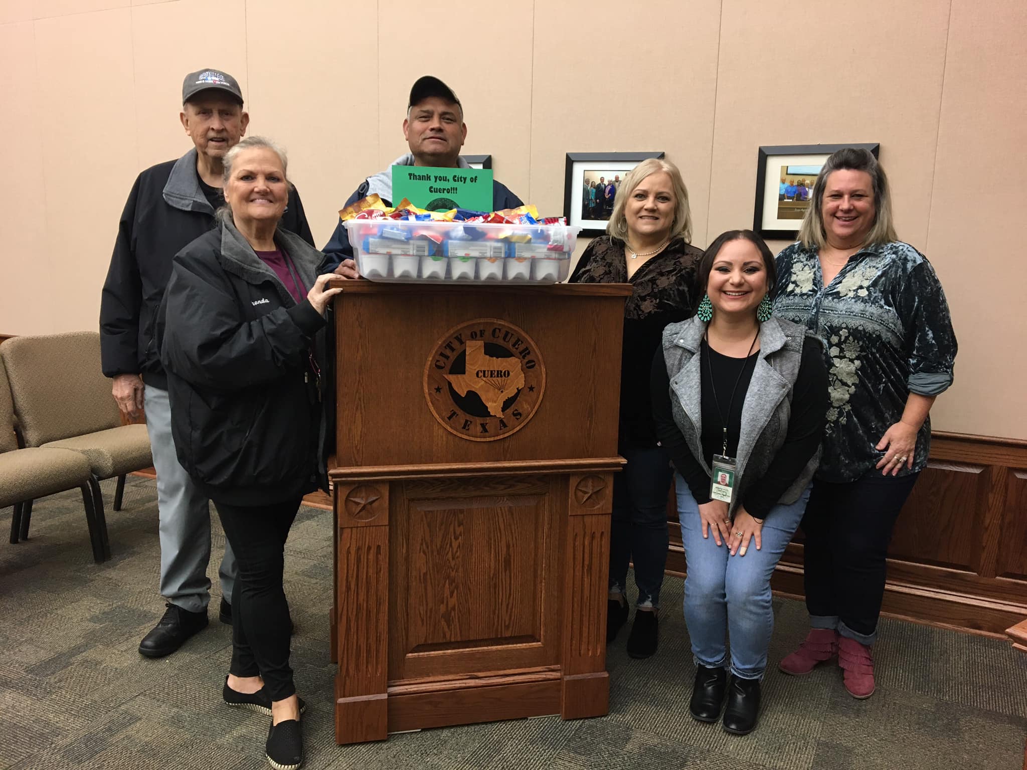 December Events Committee presents “thank you” snack care package to Cuero City Government