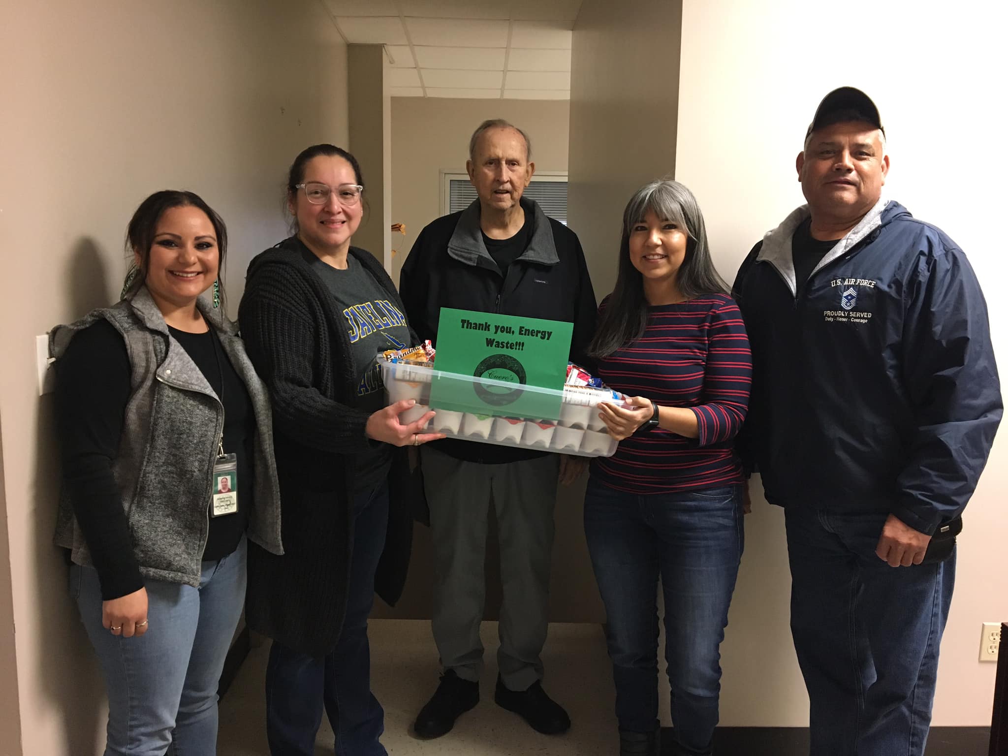 December Events Committee presents “thank you” snack care package to Energy Waste Rentals & Service