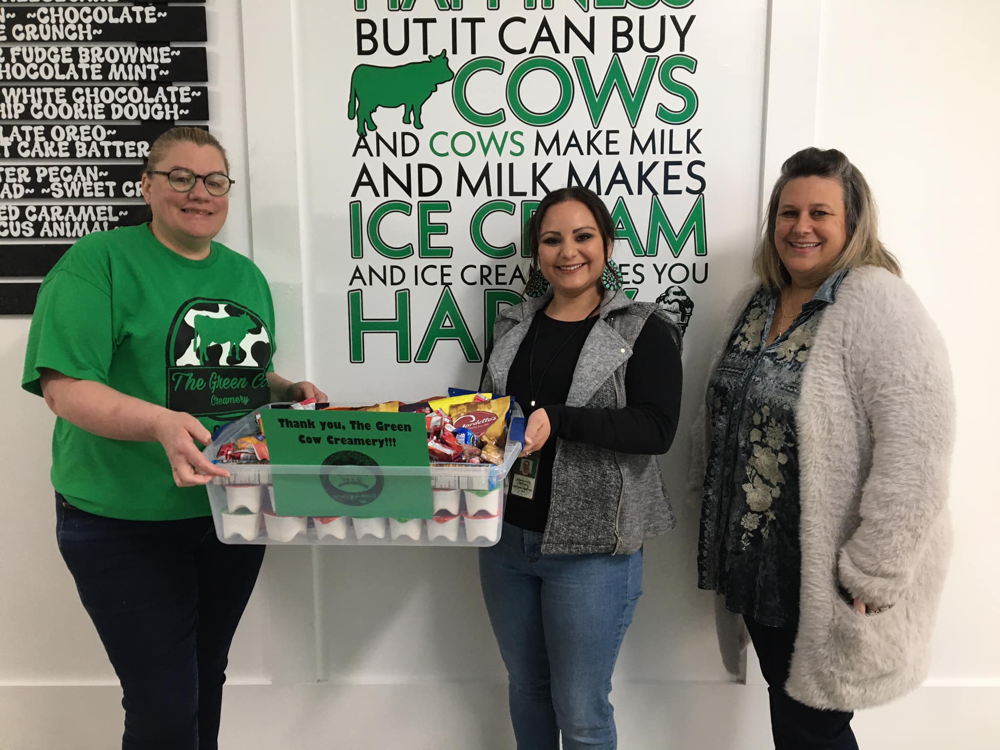December Events Committee presents “thank you” snack care package to Green Cow Creamery