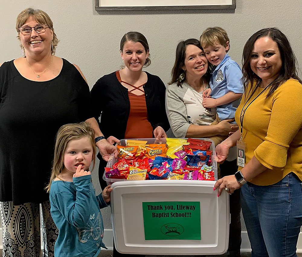 December Events Committee presents “thank you” snack care package to LifeWay Baptist School